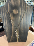 long gold tassled chain pendant necklace