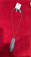 large feather necklace with turquoise stone and arrow