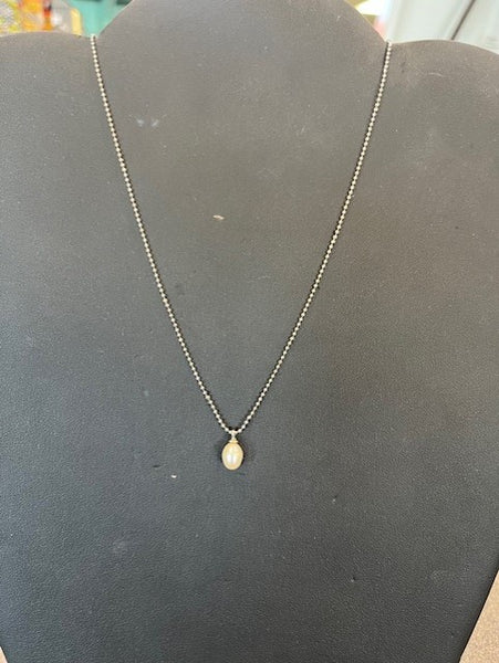 dainty pearl pendant on dainty silver chain
