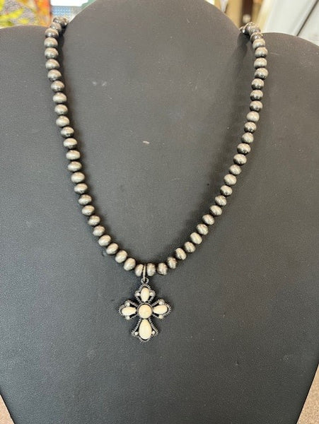 Navajo pearl necklace with buffalo white stone cross