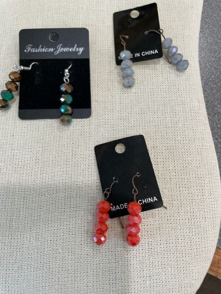 stacked beaded earrings in assorted colors