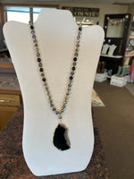 long beaded necklace with natural stone pendant