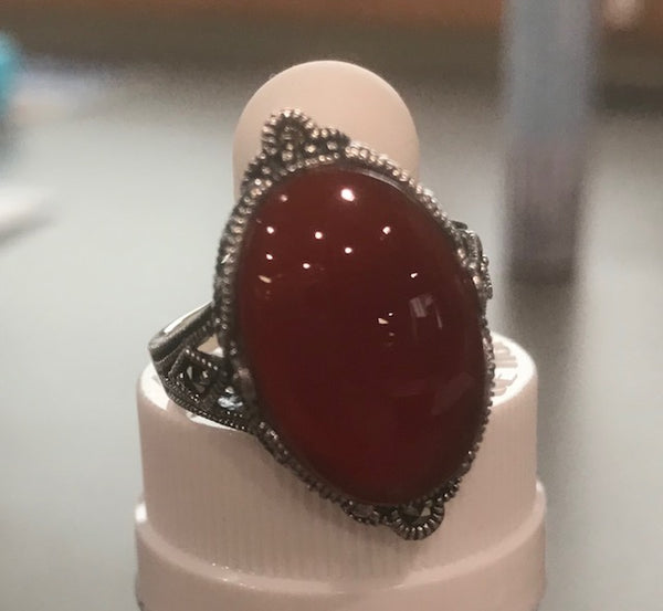 sterling silver ring with red stone