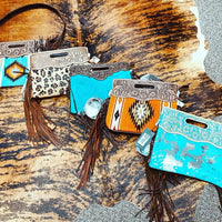 cross body bags, leather tooling & fringe with different body style prints or leather