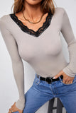 long sleeve stone colored double vneck with black lace trim